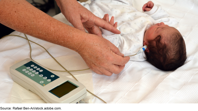 A baby getting a hearing test