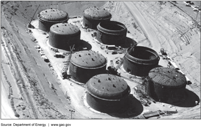 This is a photo of 8 tanks being constructed to store nuclear waste on land in the state of Washington. 