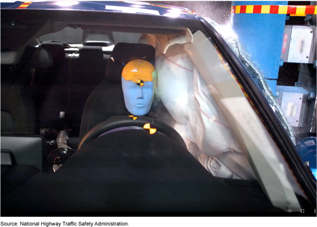 A crash test dummy in a side impact vehicle crash test.