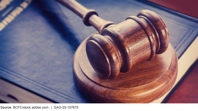 A gavel on a book.