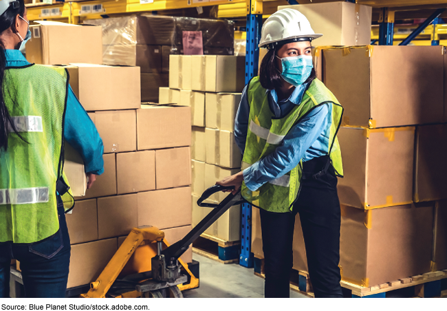 masked warehouse workers