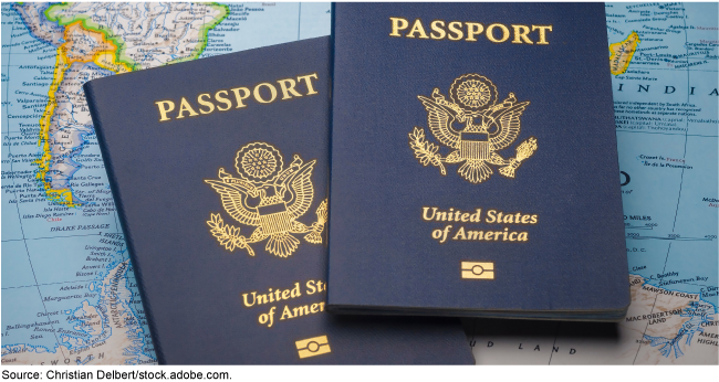 Two U.S. passports resting on a world map