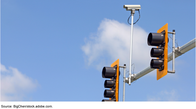 Traffic lights with a speed camera attached