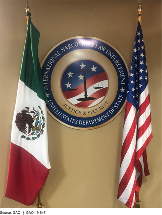 U.S. and Mexico flags, International Narcotics & Law Enforcement seal 