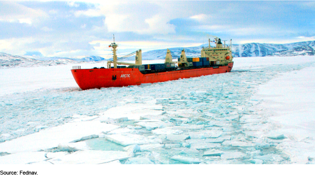 An image of a commercial ship navigating through ice in Arctic waters.