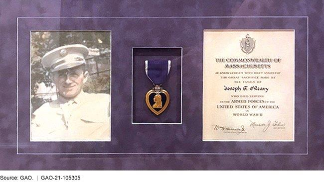 Image of framed photo of World War II veteran, his commendation, and Purple Heart medal