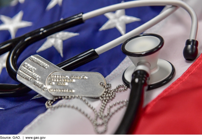 A stethoscope and dog tags on an American flag