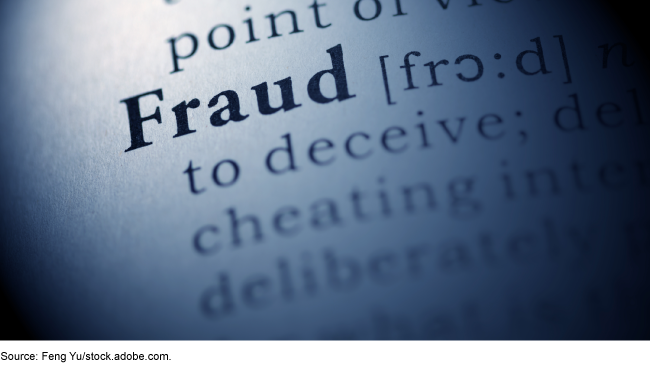 An image of the word 'fraud' on a dictionary page. 