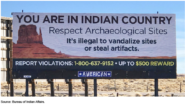 Billboard with message about respecting Indian artifacts