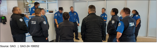 Transportation Security Officers Gather for a Shift Briefing