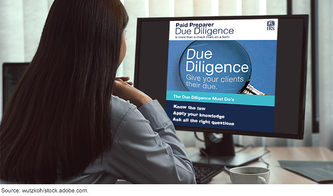 Woman looking at IRS website page on paid preparer due diligence.