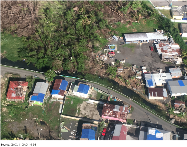 This photo shows roof damage to buildings in Puerto Rico following Hurricane Maria. 