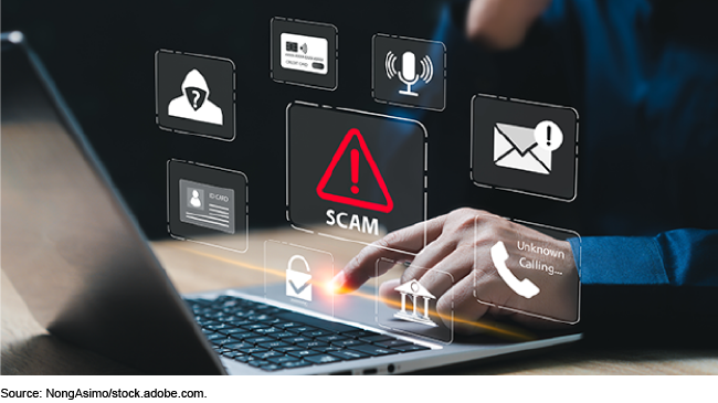Person sitting at a computer with icons related to cyber threats overlayed