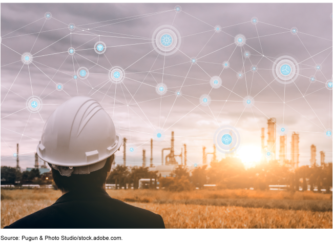 Person in a hard hat looking at infrastructure with AI icons superimposed