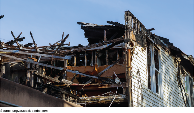 A house damaged in a fire caused by a lightning strike