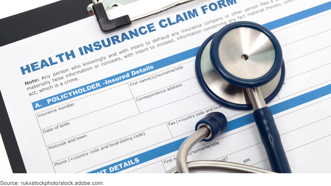 Health insurance claim form and a stethoscope 