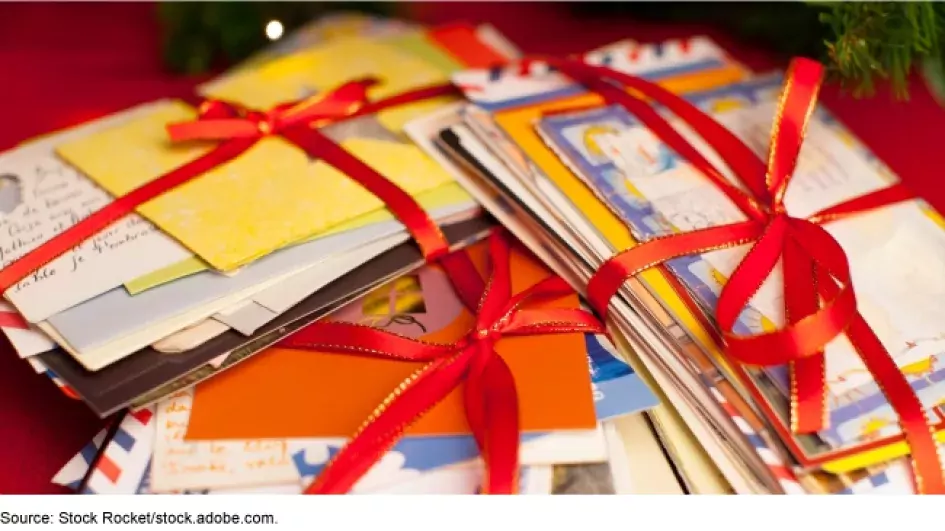 Photo showing letter mail bundled by red ribbons