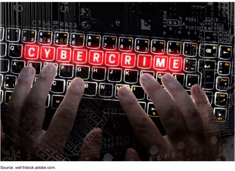 Illustration of a computer keyboard with the word "cybercrime" highlighted in red on the keys.