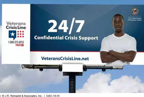 Photo of a billboard advertising the Veterans CrisisLine suicide hotline