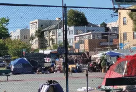 Photo of a homeless encampment in Oakland.