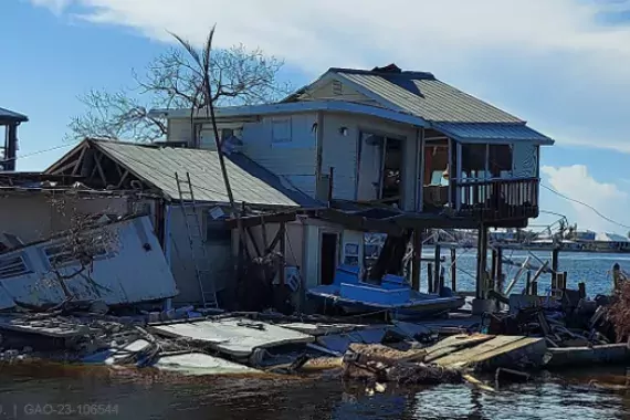 Photo showing damage to a beach front home in Florida after Hurricane Ian in October 2022